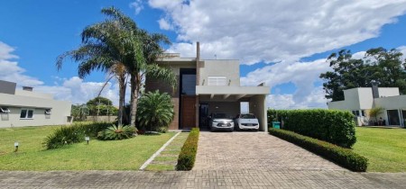 Casa em Condomínio 4 dormitórios para venda, Araça em Capão da Canoa | Ref.: 5063